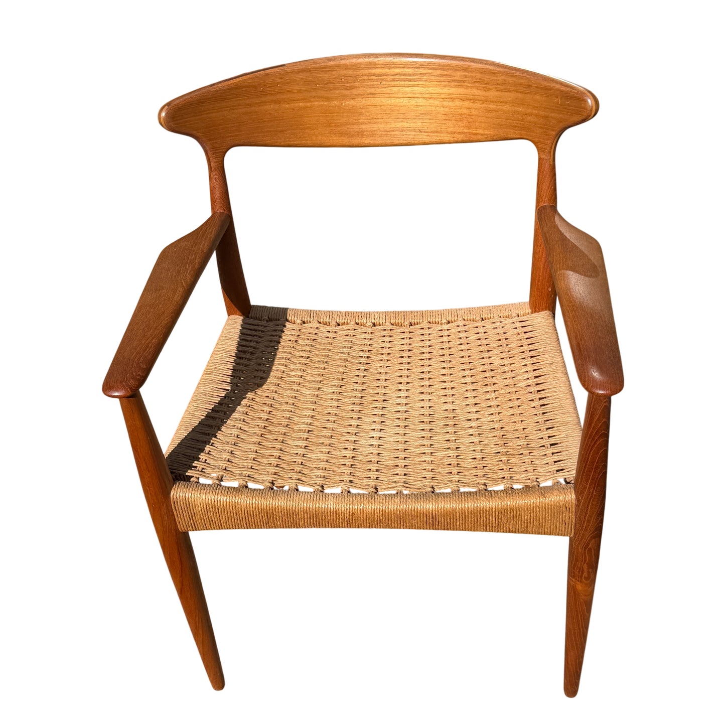 Rear view of the teak chair backrest and double leg supports