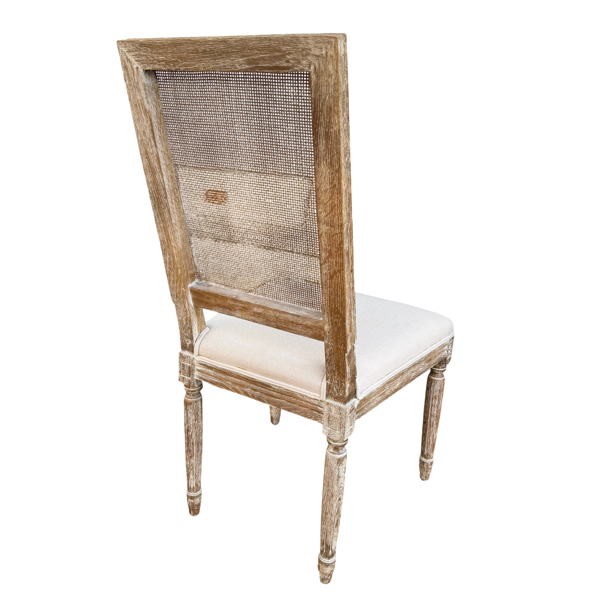 Pair of contemporary French-style chairs with cane backs in a rustic finish