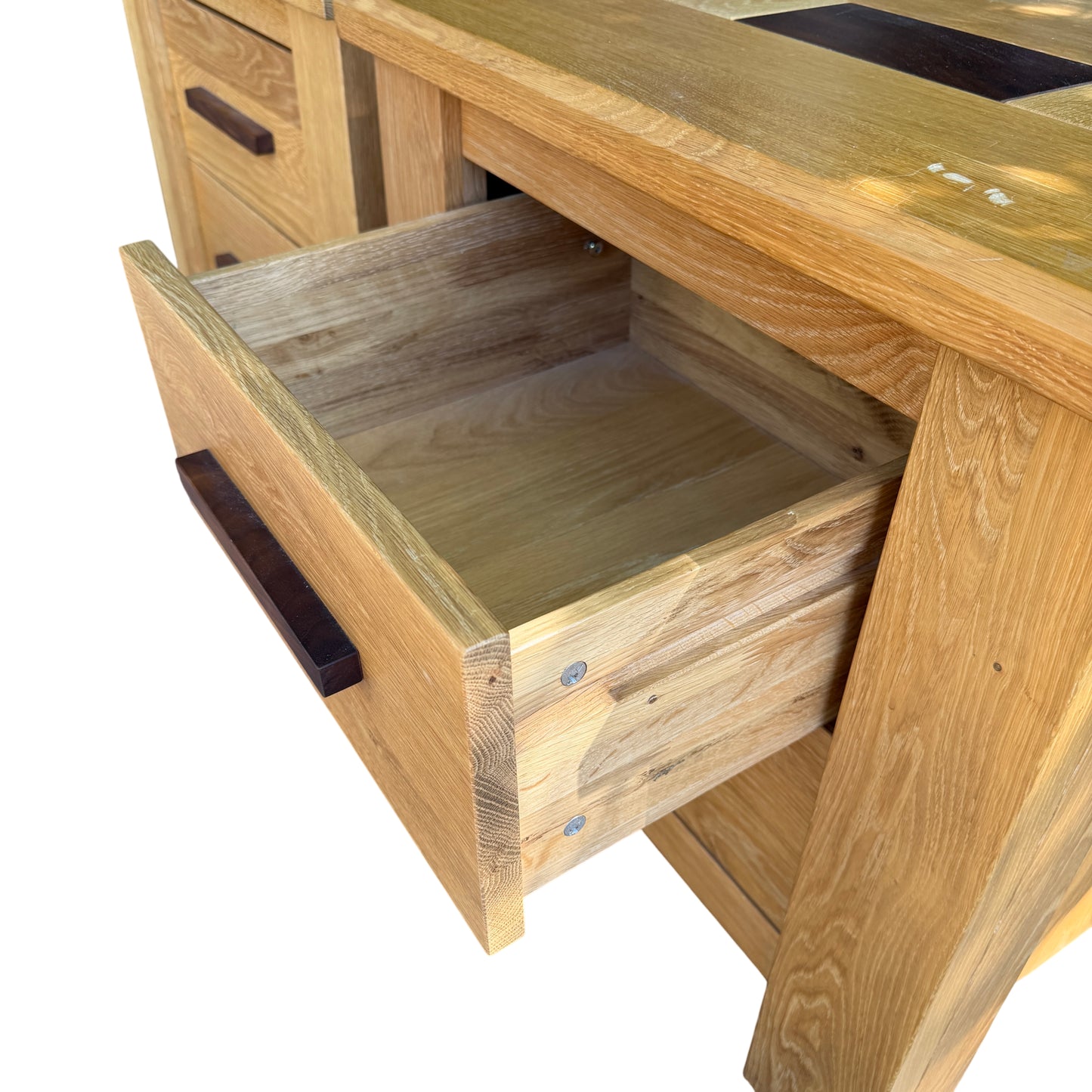 Top edges and corners of oak bedside cabinets with light finish wear