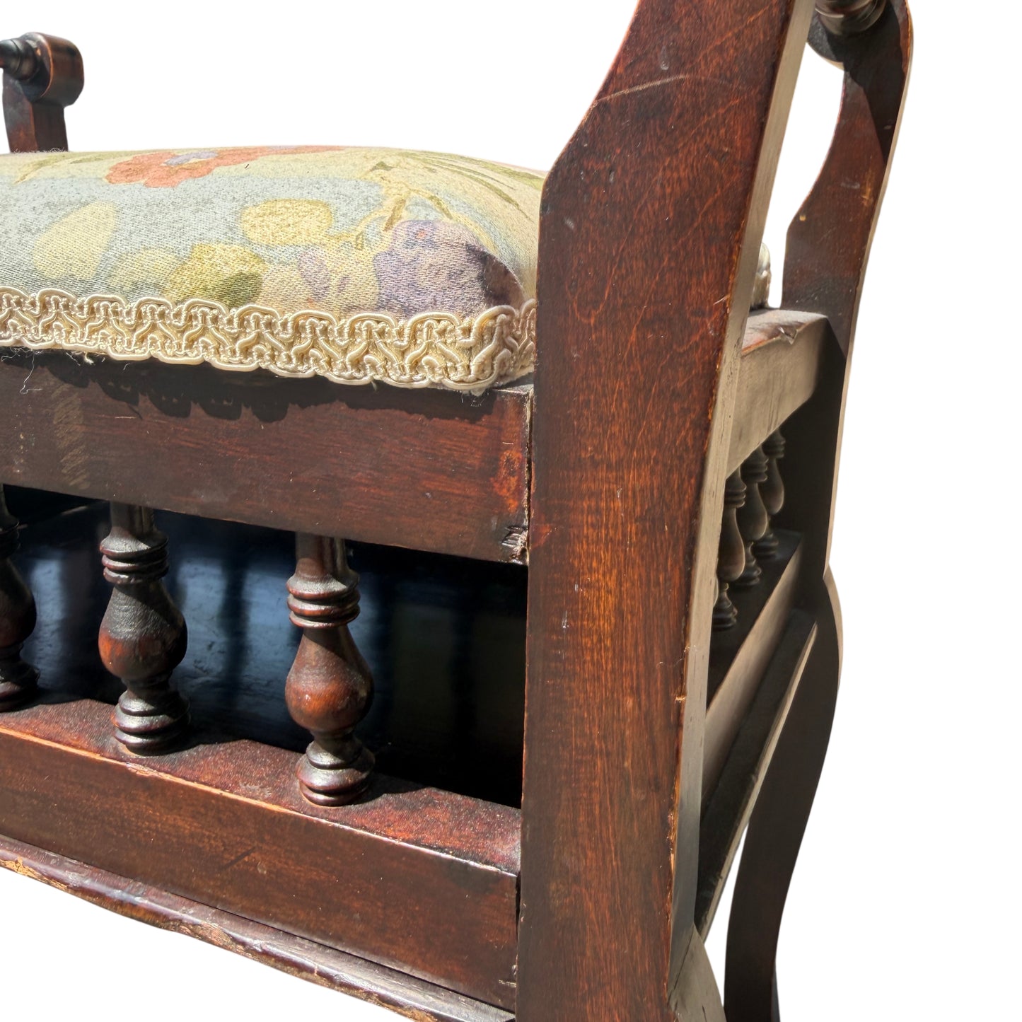 Detailed view of turned spindle and joint construction on a Victorian stool