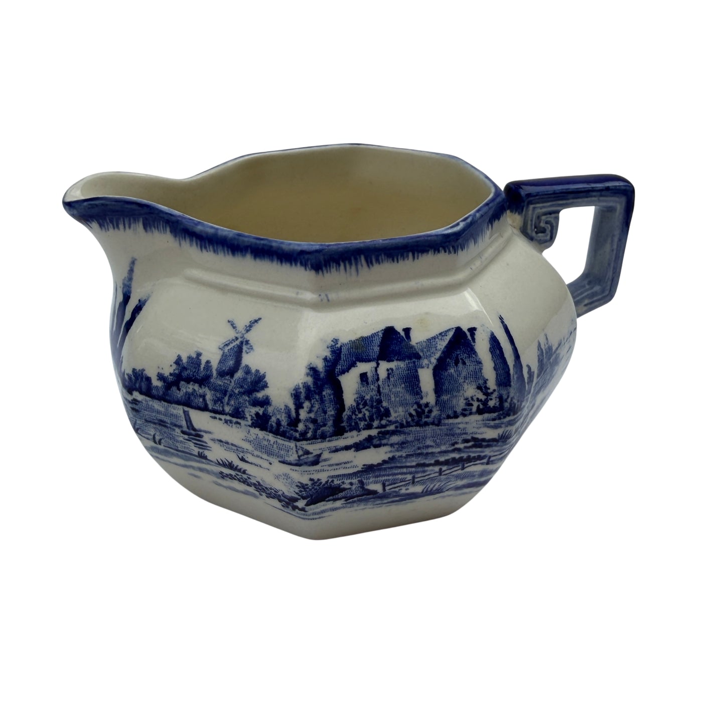Handle and shoulder detail of Royal Doulton Norfolk transferware milk jug