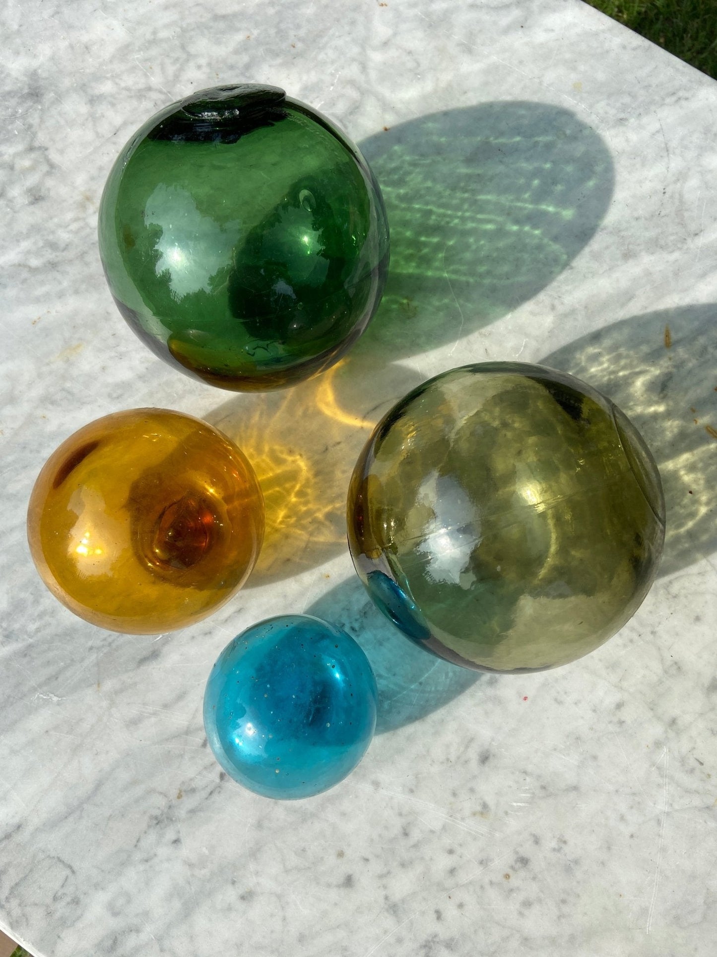 Set of Four Antique Glass Nautical Fishing FloatsThe Furniture Recycling Shop