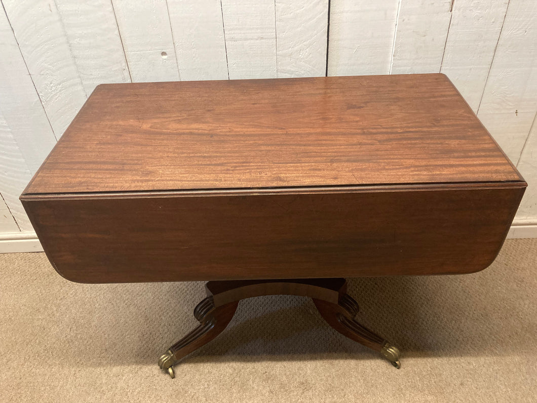 Antique Mahogany Drop Leaf Table On Pedestal With A Drawer Brass Castors