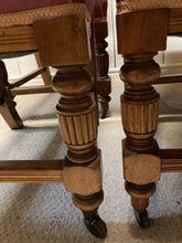 Load image into Gallery viewer, Antique Set Of Four Oak Carved Chairs Upholstered In Pink Velour Castors To Front Legs
