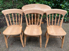 Load image into Gallery viewer, Solid Pine Round Table On A Pedestal And Three Sturdy Chairs Set
