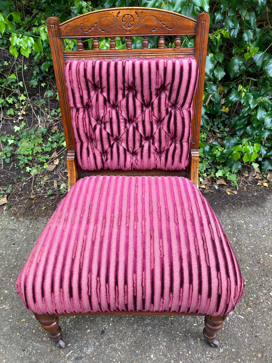 Victorian Button Back Open Armchair On Turned Legs And Castors