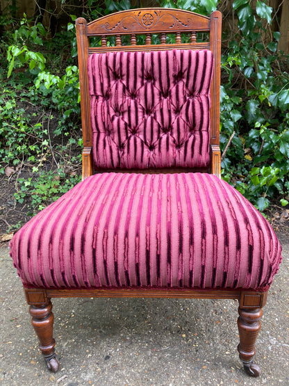 Victorian Button Back Open Armchair On Turned Legs And Castors