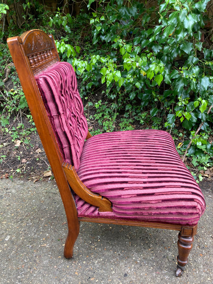 Victorian Button Back Open Armchair On Turned Legs And Castors