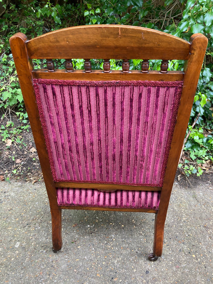 Victorian Button Back Open Armchair On Turned Legs And Castors