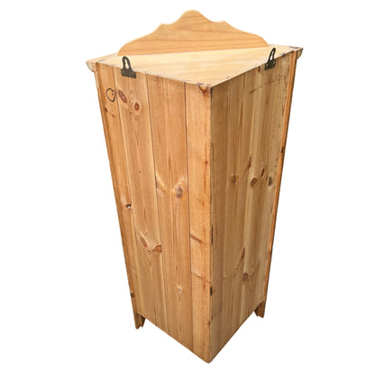 Side view showing oak grain and dovetail drawer construction