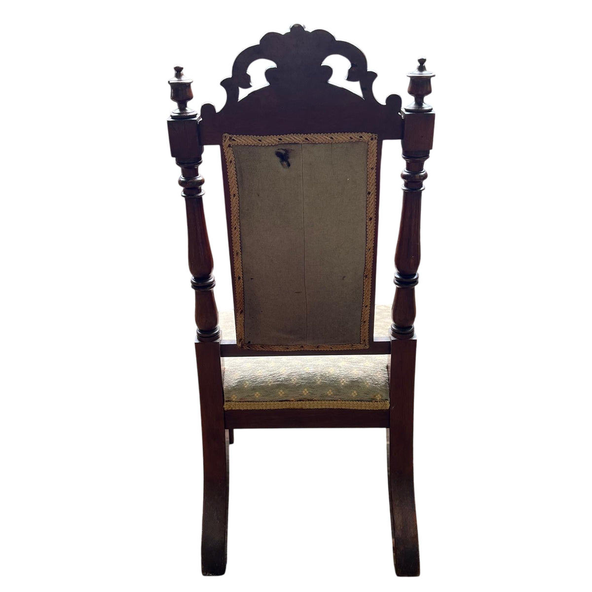 Turned front leg and carved apron on a Victorian dining chair