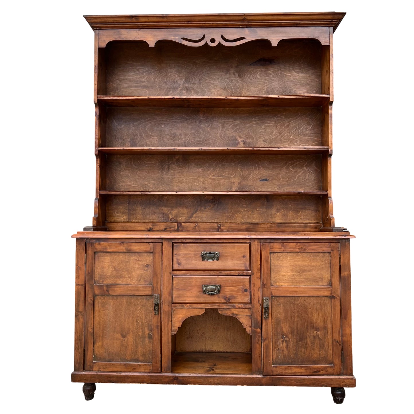 Side view of pine dresser showing turned feet and solid pine construction