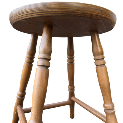 Underneath view of stool legs and stretchers showing construction style