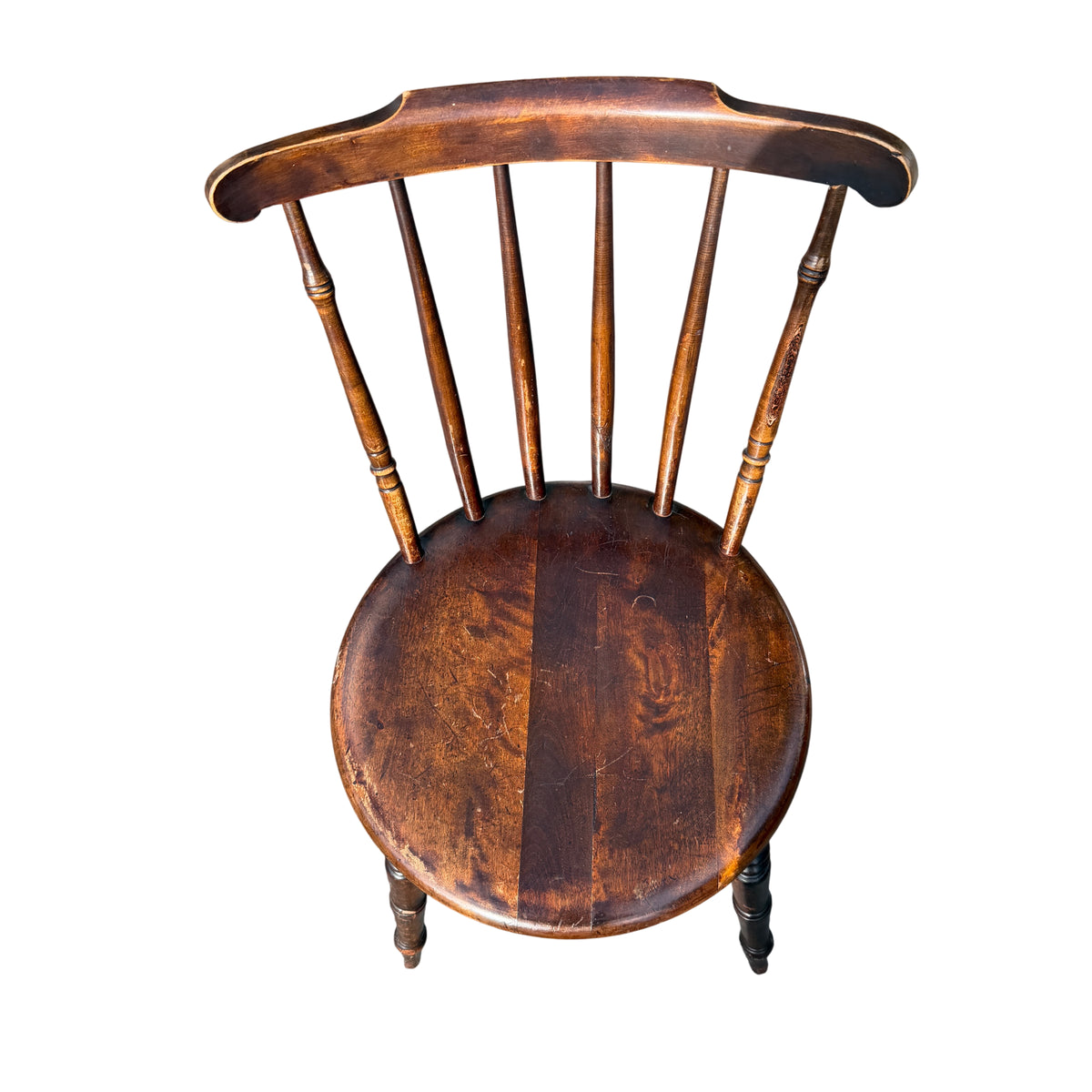 Vintage wooden kitchen chair with penny seat and slight joint movement visible in leg join