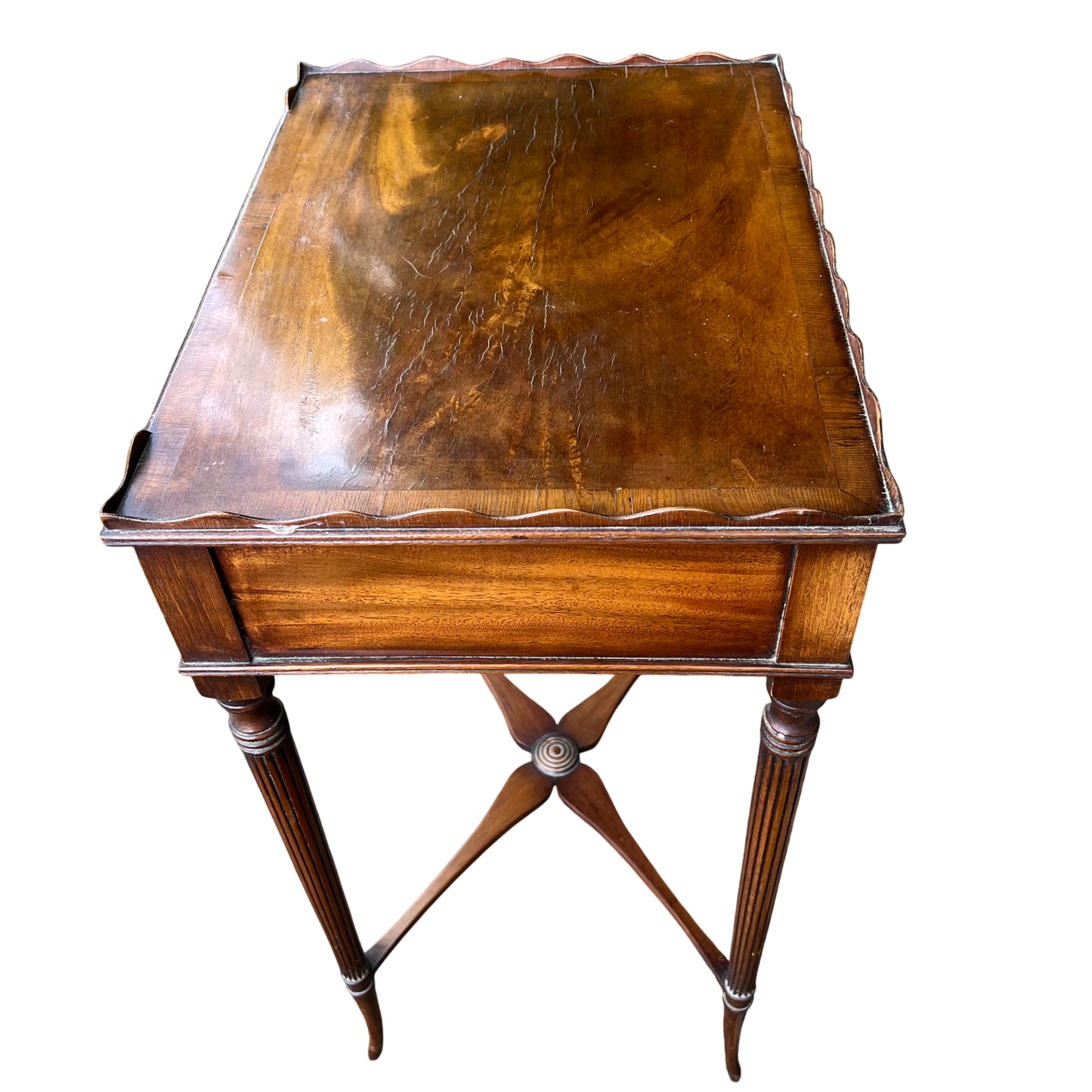 Antique walnut lamp table with slender fluted legs and rosette stretcher