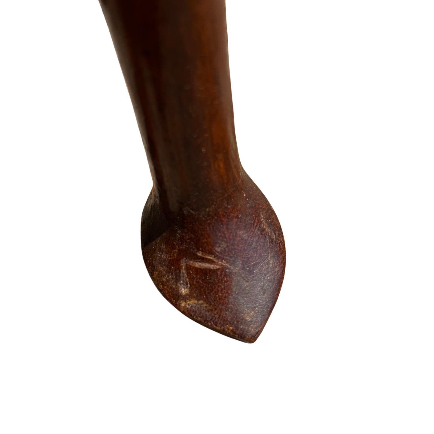 Close-up of decorative metal drawer knob on bedside cabinet