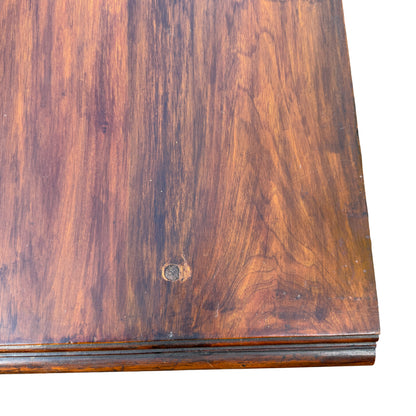 Base plinth and lower panels of a Victorian‑style carved sideboard