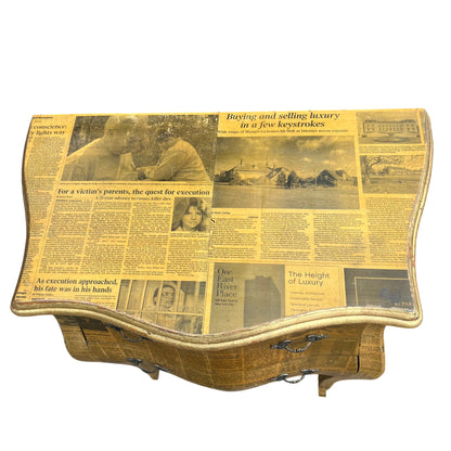 Front view of two-drawer decoupage bedside chest with decorative metal handles