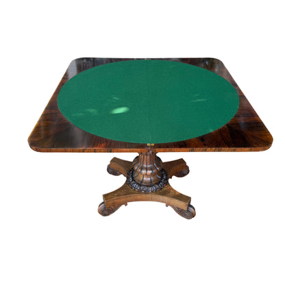 Early Victorian rosewood tilt-top card table with green baize top and turned carved pedestal
