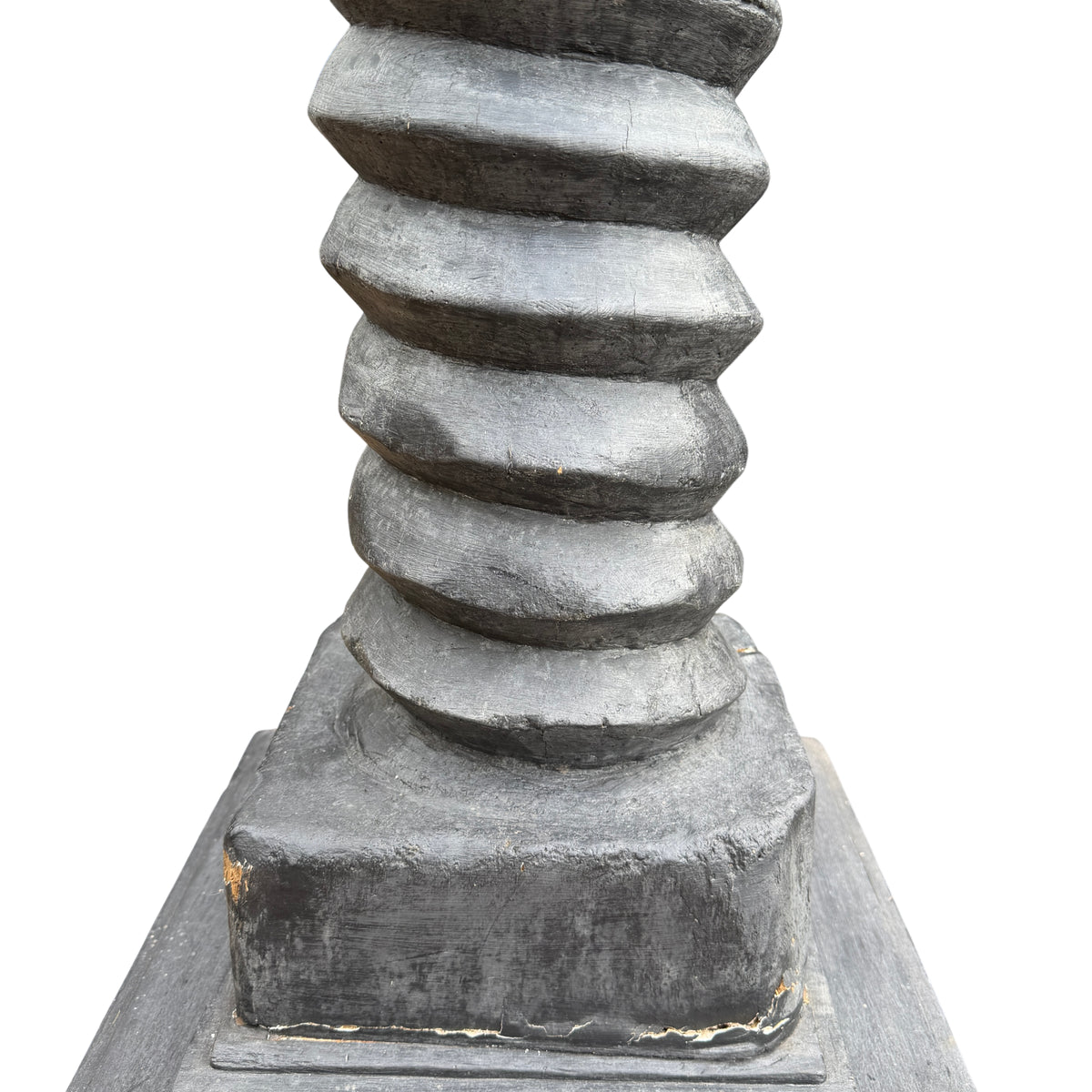 Decorative pedestal stand showing stepped base and square top in charcoal black