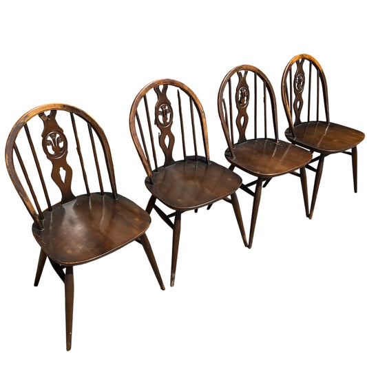Set of four vintage Windsor-style dining chairs dark stained solid wood spindle backs