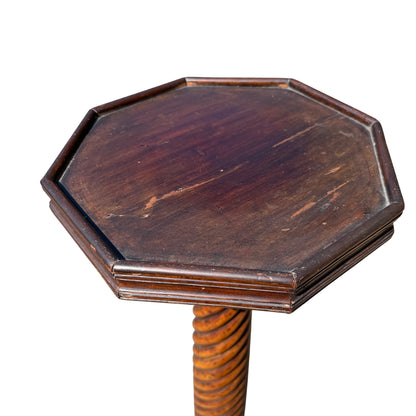 Close-up of octagonal top and moulded edge on Victorian plant stand