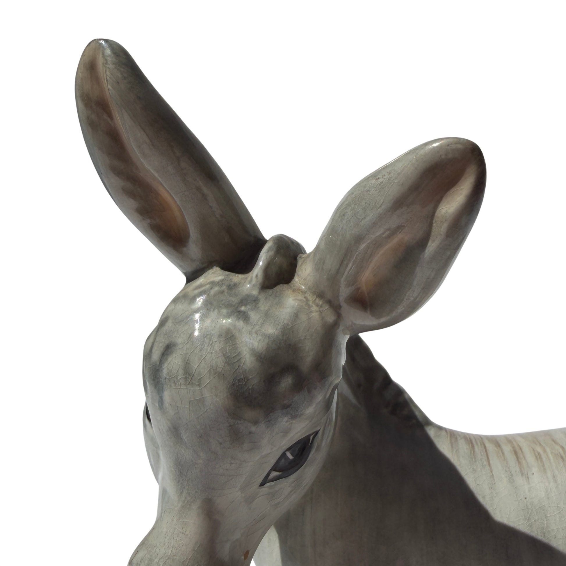 Close view of porcelain donkey hooves with light discolouration on Wedgwood figurine