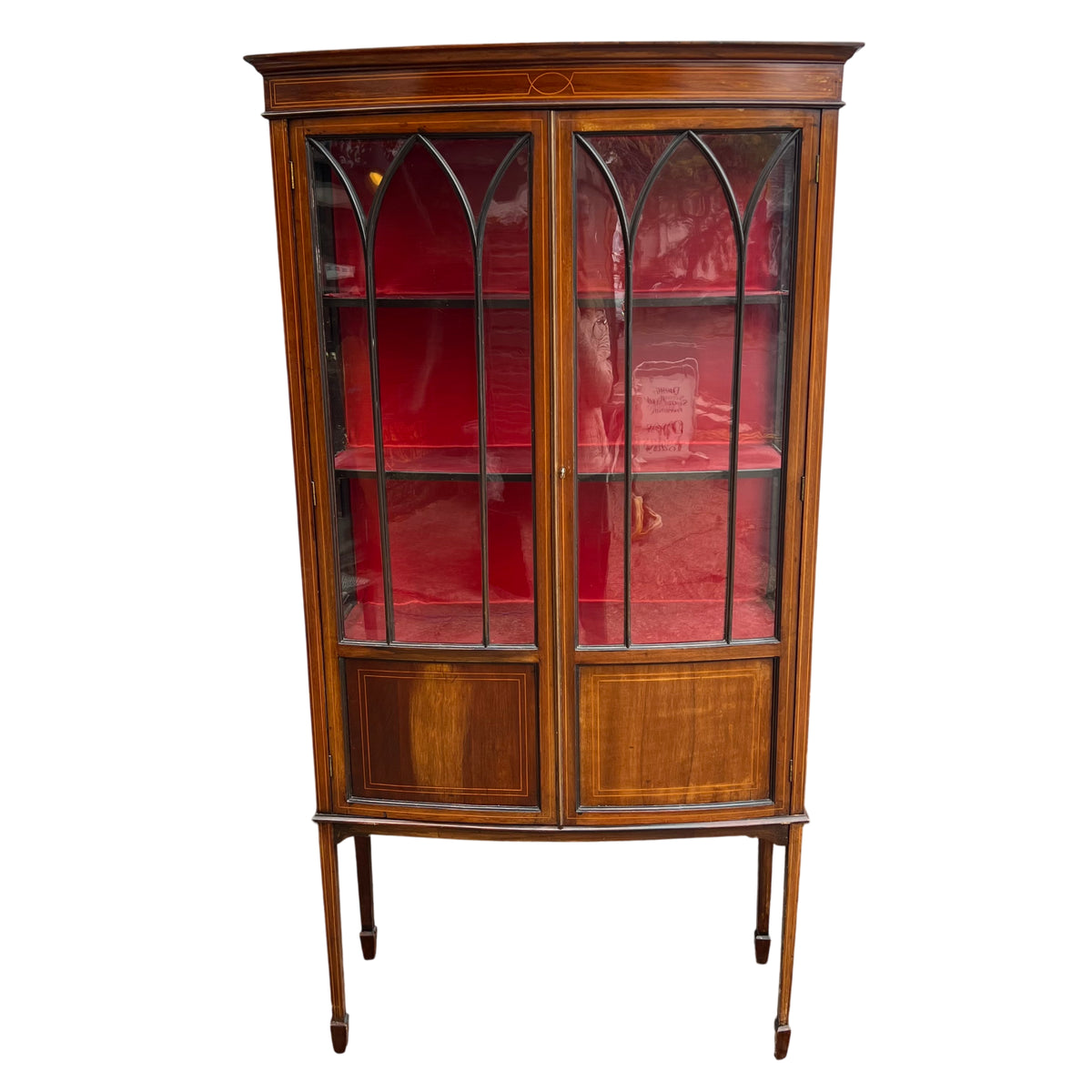 Edwardian inlaid mahogany glazed display cabinet with leaded arched glass doors and red lined interior