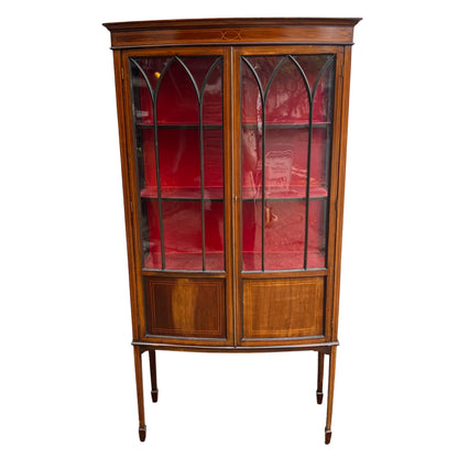 Edwardian inlaid mahogany glazed display cabinet with leaded arched glass doors and red lined interior
