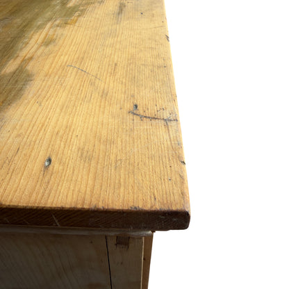 Base view showing carved bracket feet and scuffing to plinth