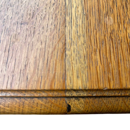 Detail of oak grain on drawer front of Arts & Crafts style chest