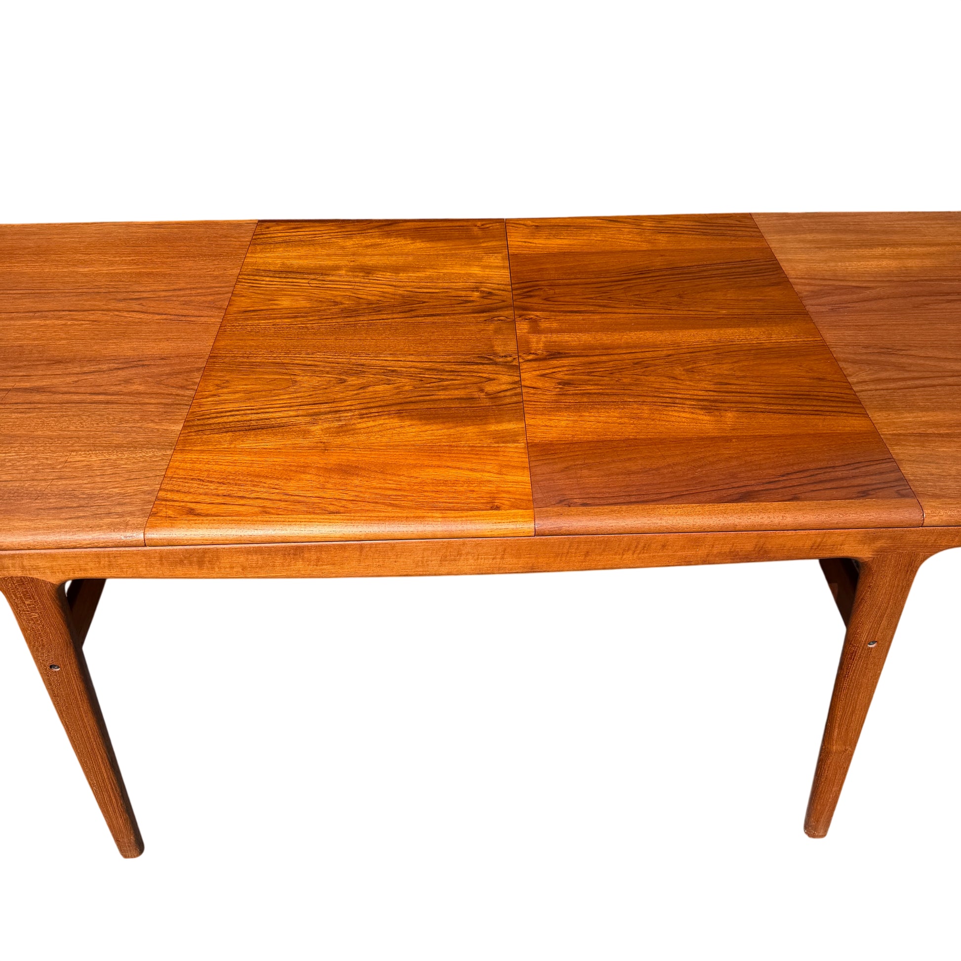 Detail of teak grain across the top of a 1960s Danish extending dining table