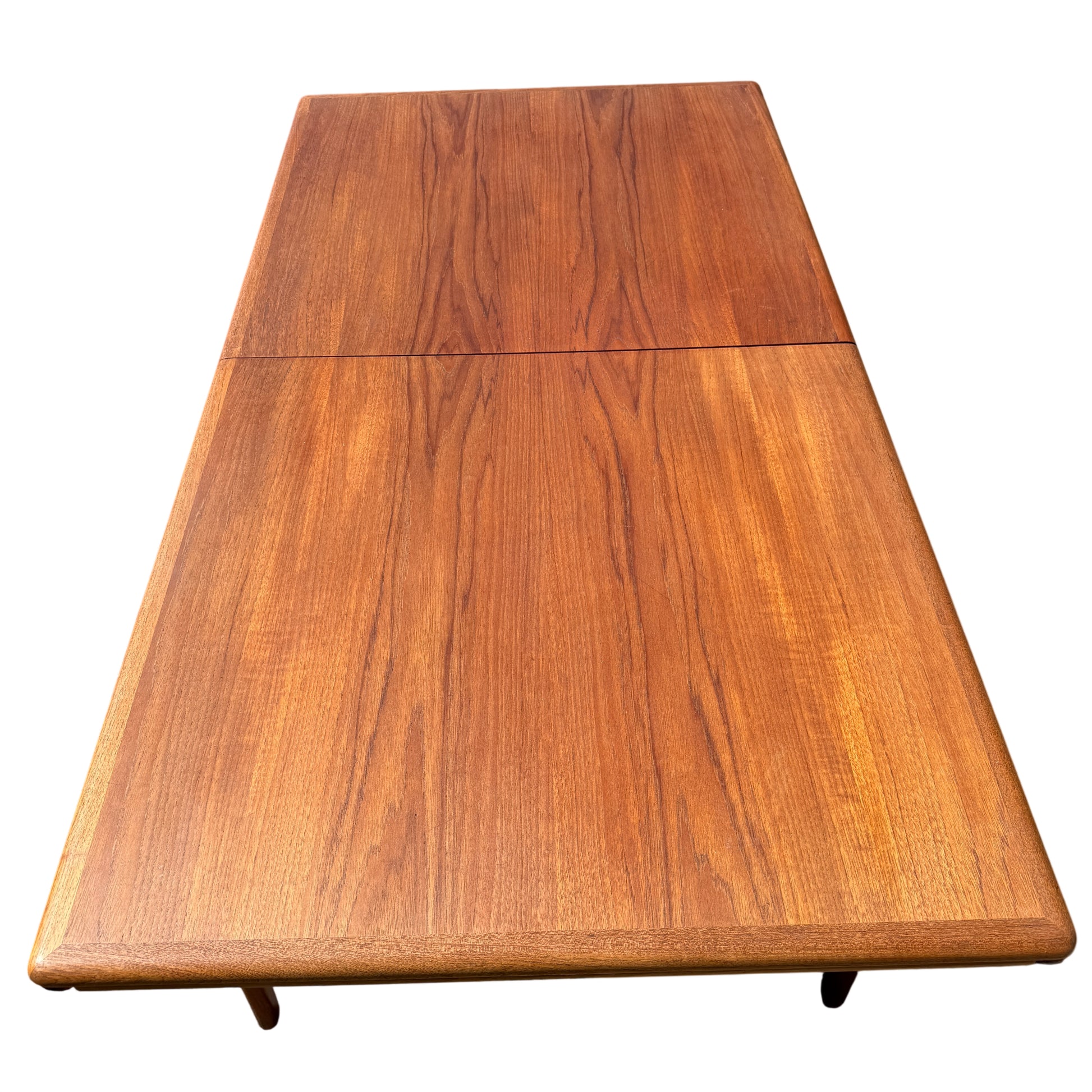 Vintage Scandinavian teak dining table photographed at a secondhand furniture sale
