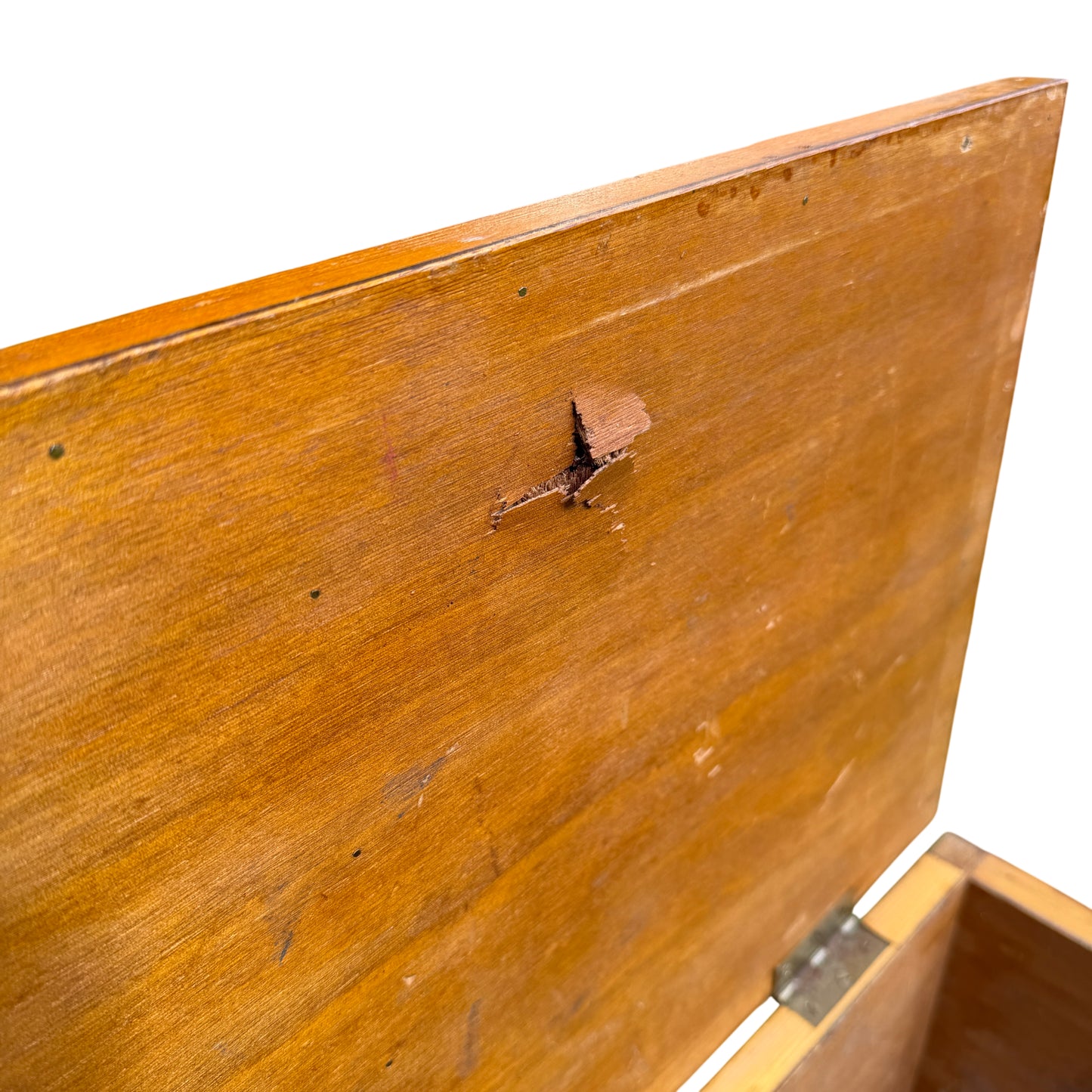 Side view of pine chest showing small split and scuffed finish