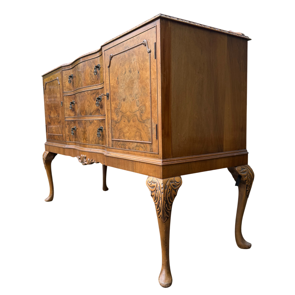 Top view showing burr veneer surface and moulded carved edge of sideboard