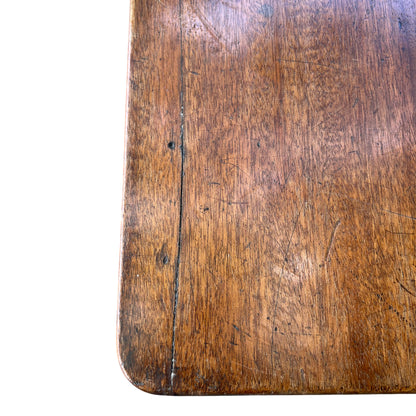 Slender turned legs on a Victorian oak hall table, dark turned finish