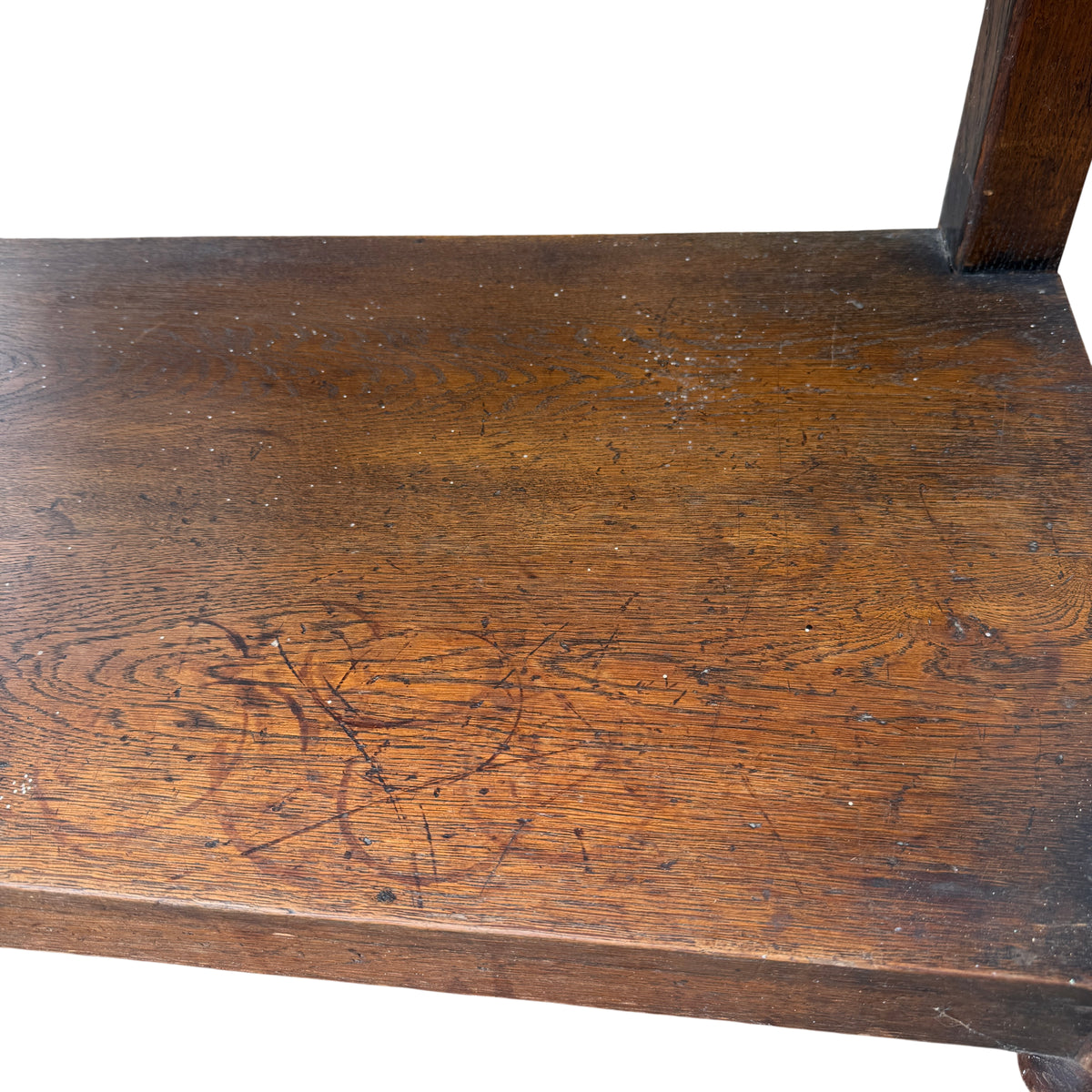 Top surface of oak dresser with visible ring marks and surface scratches