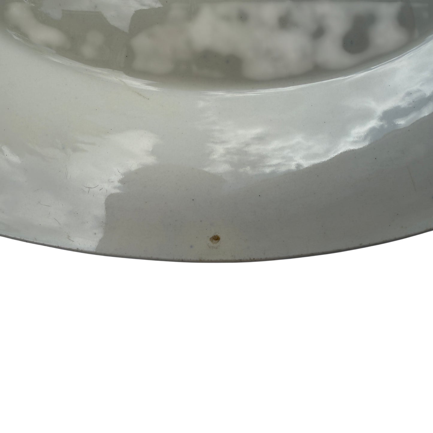 Close-up of gilt rim and transferware decoration on Burleigh soup bowl