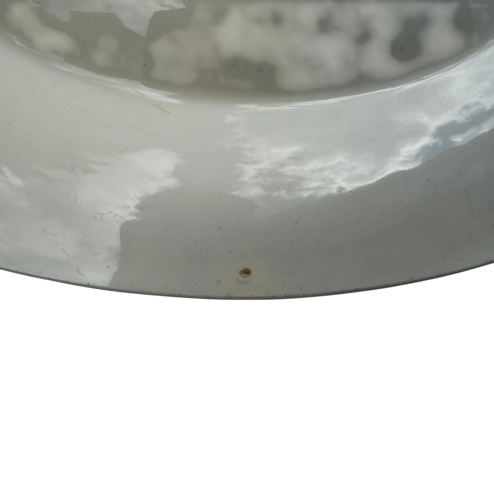 Close-up of gilt rim and transferware decoration on Burleigh soup bowl