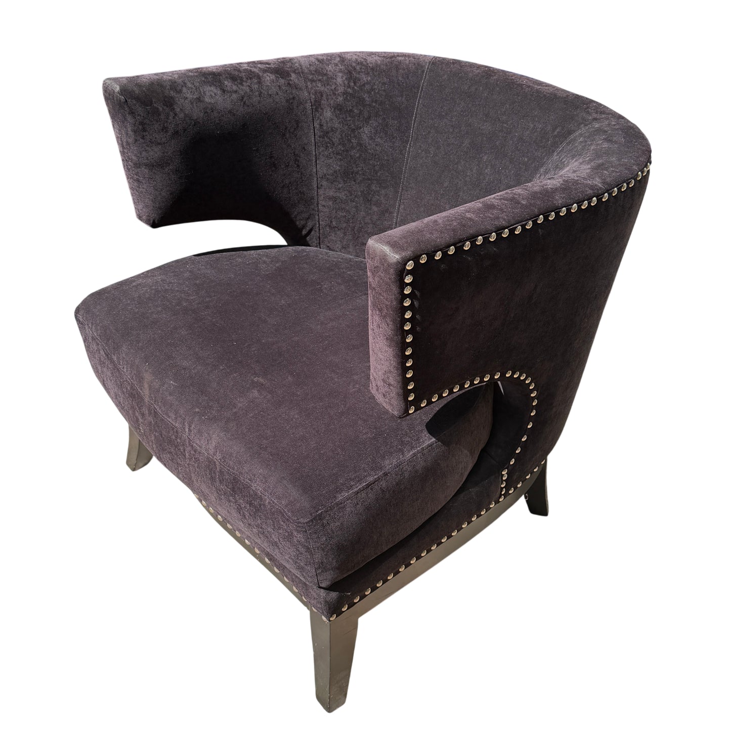 Large rounded seat cushion of black velvet-effect armchair with timber legs