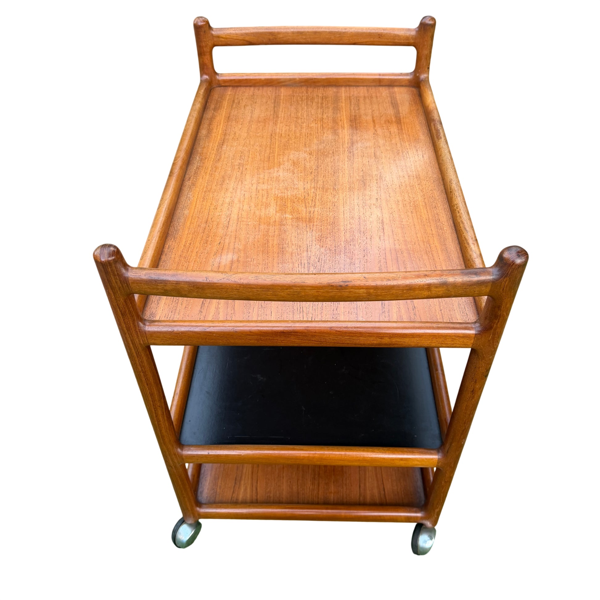 Vintage Danish teak serving trolley with turned rounded corners