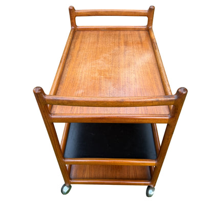 Vintage Danish teak serving trolley with turned rounded corners