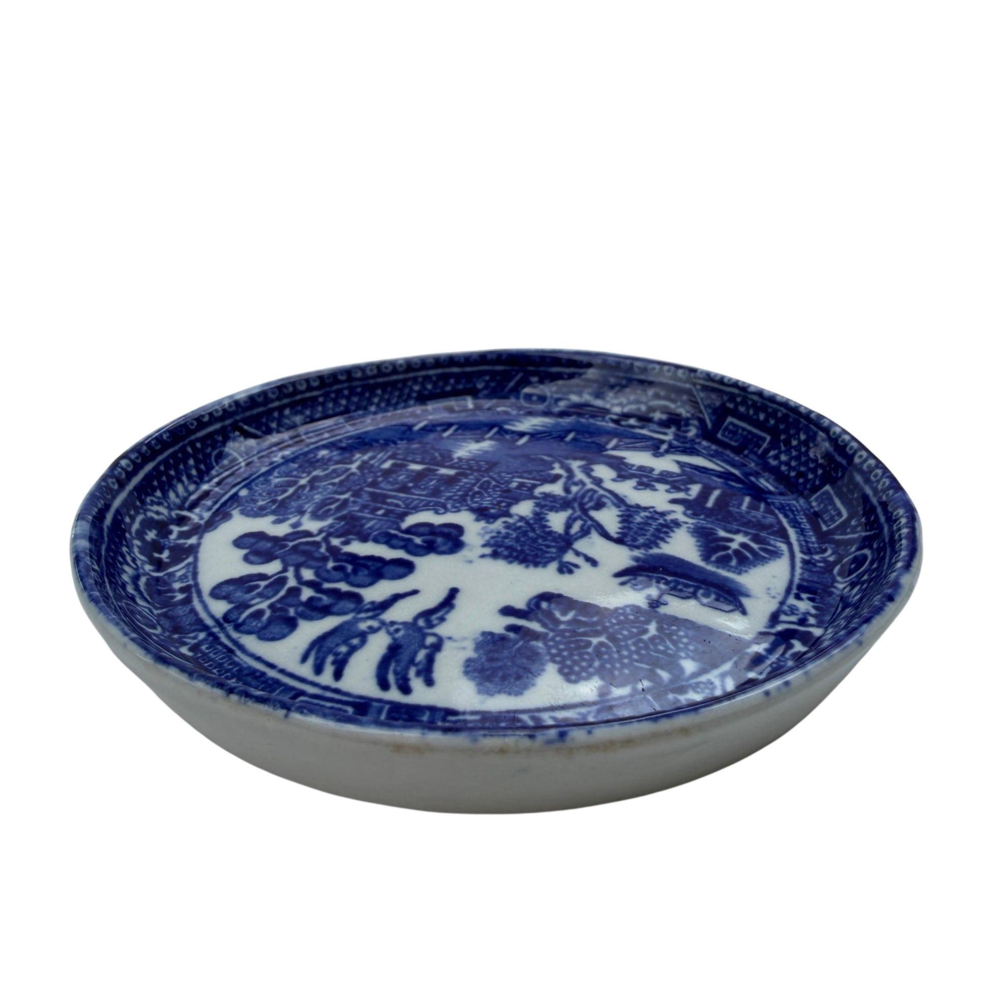Interior view showing Willow pattern transferware decoration and glazing