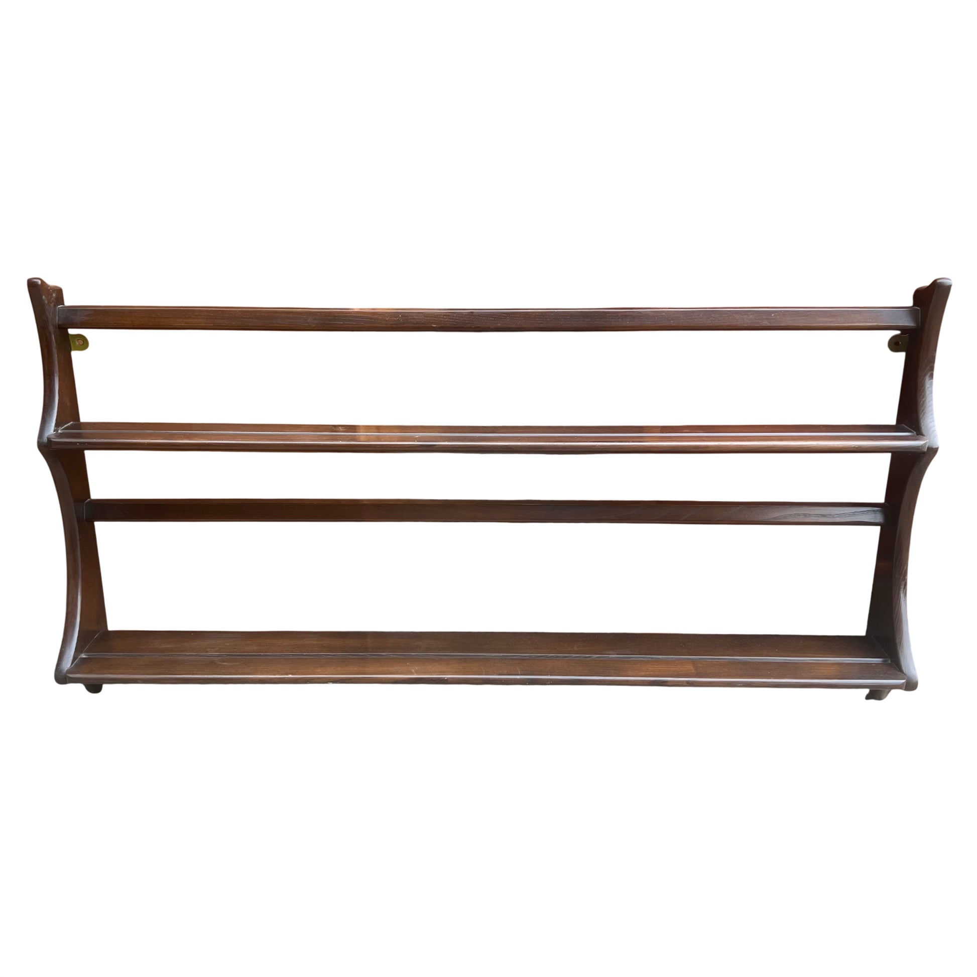 Ercol mid-century three-tier wall-mounted plate rack in dark-stained wood with maker's label visible