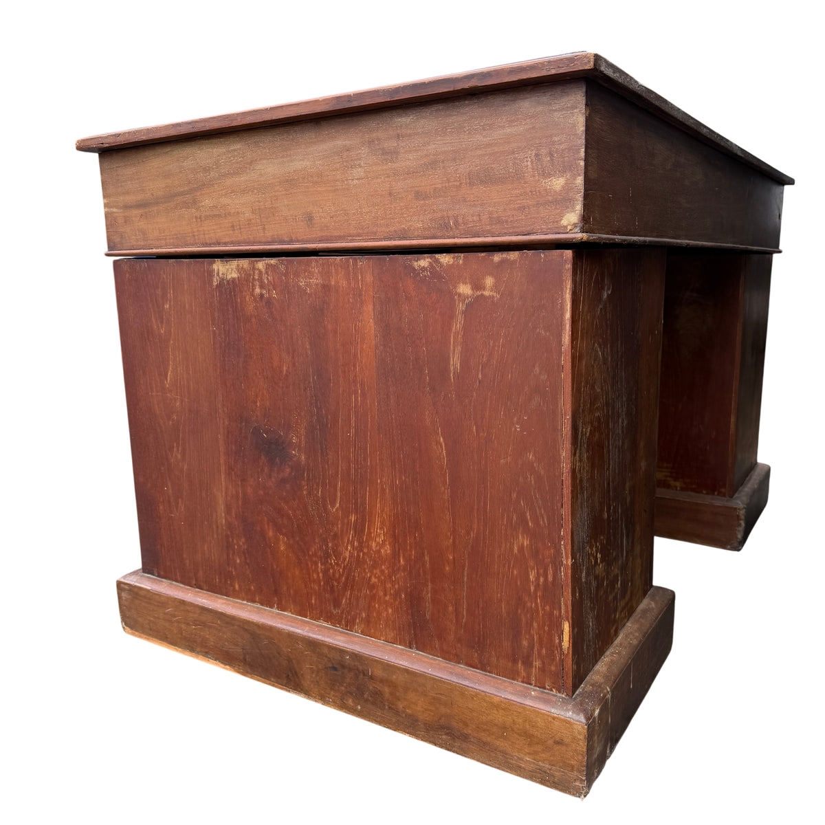 Detail of turned wooden drawer knobs on a mahogany pedestal desk