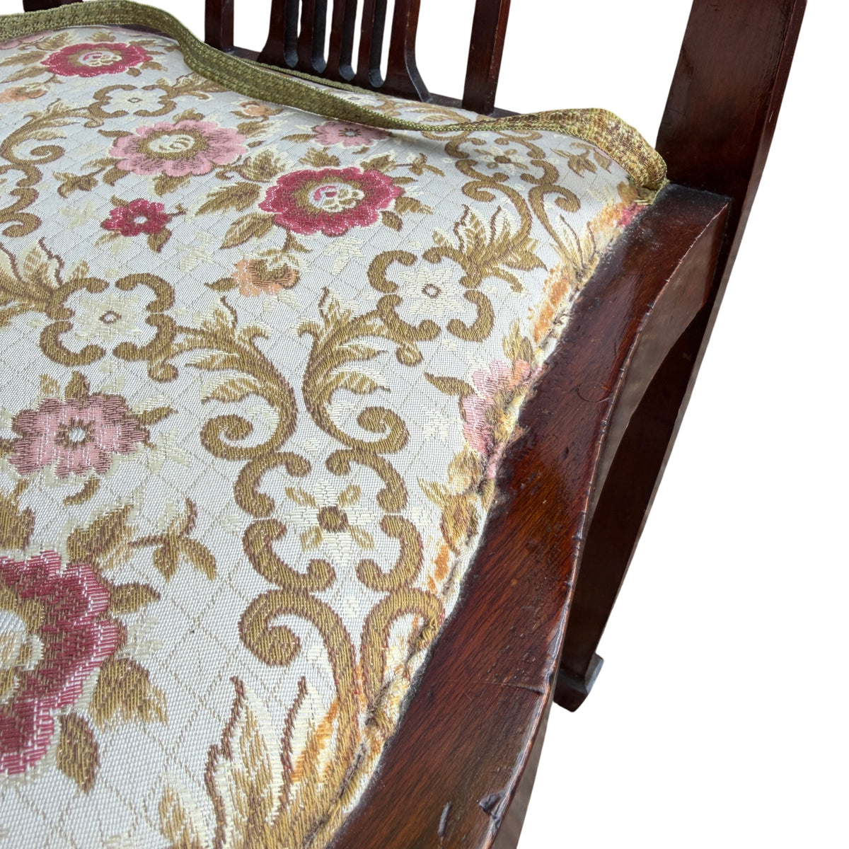 Side view of mahogany arm and turned spindle of period corner chair