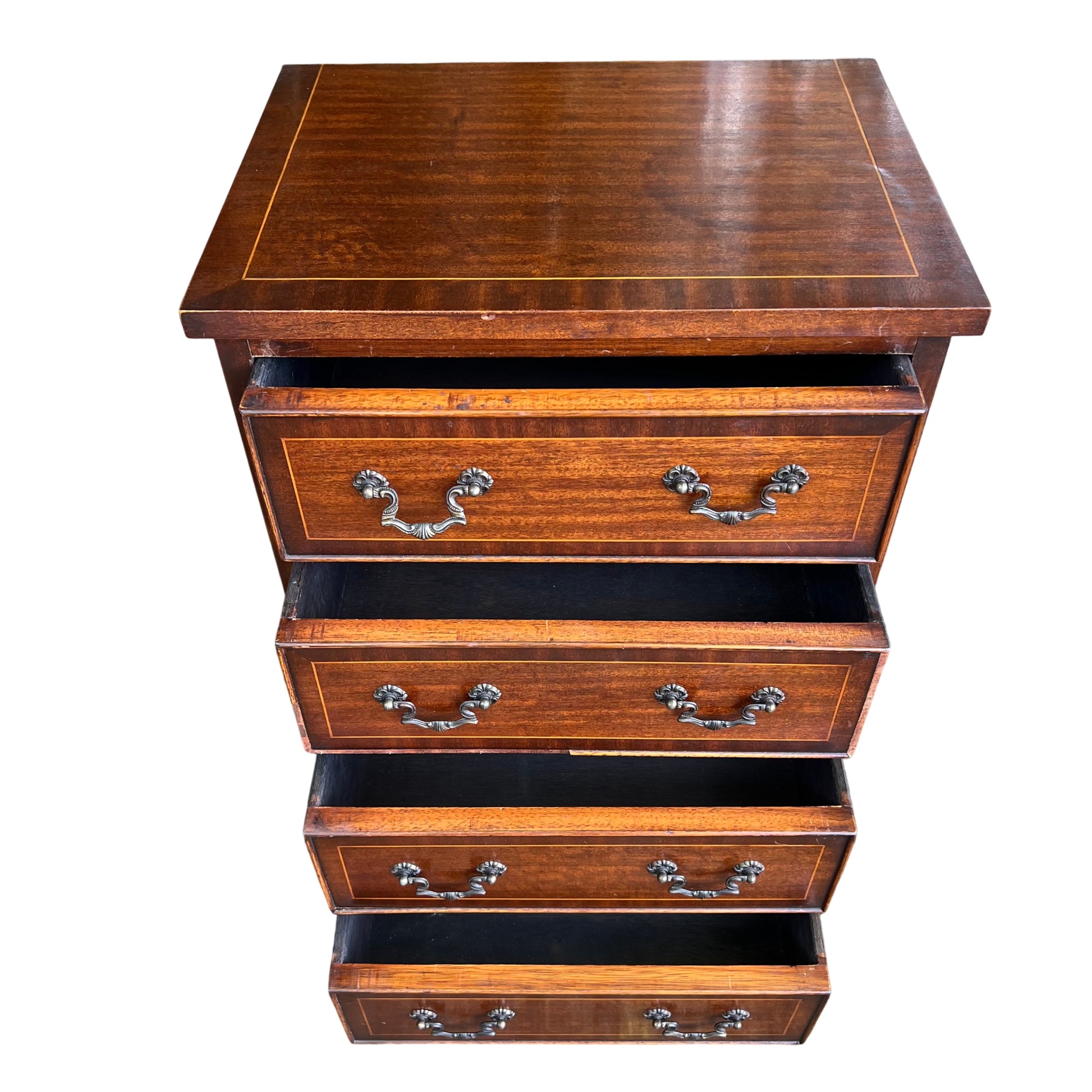 Full height view of narrow tallboy chest with five pairs of brass handles and shaped base