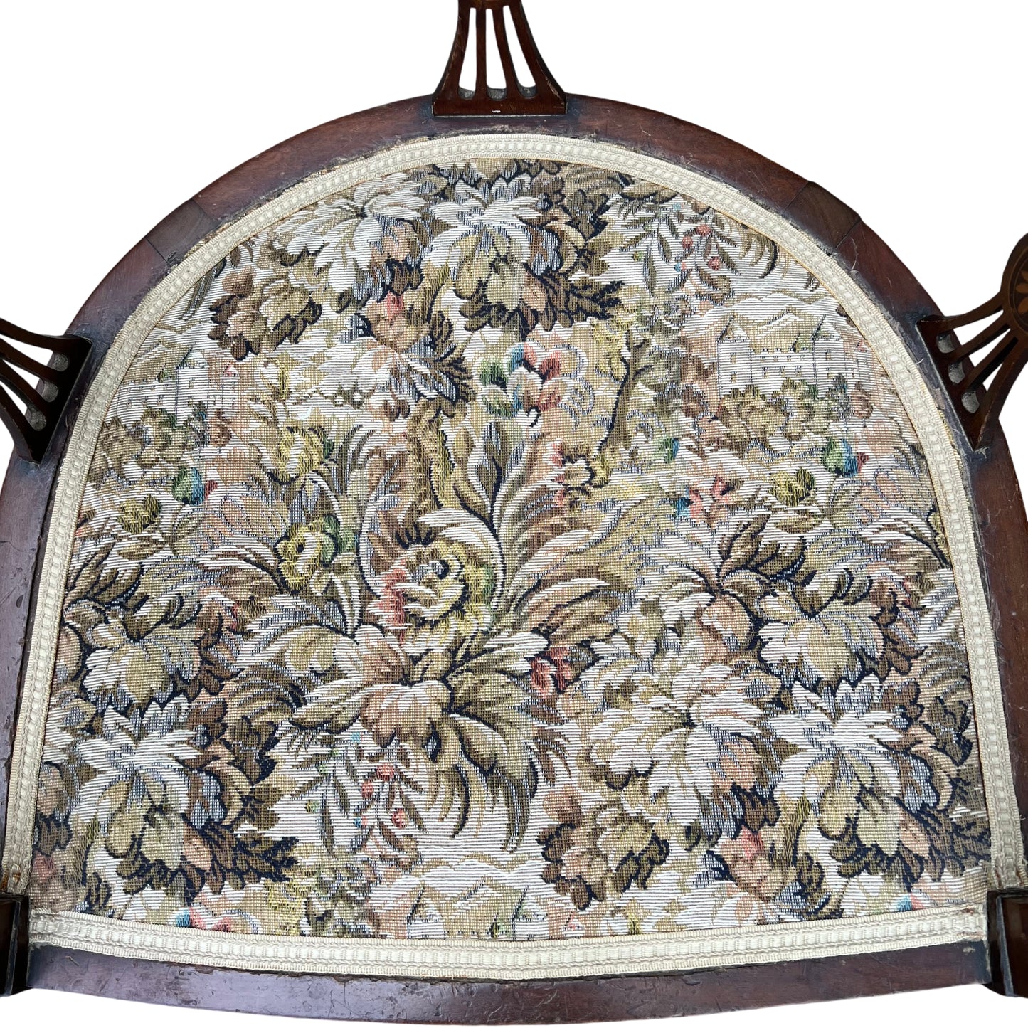 Floral tapestry upholstered seat on vintage mahogany armchair