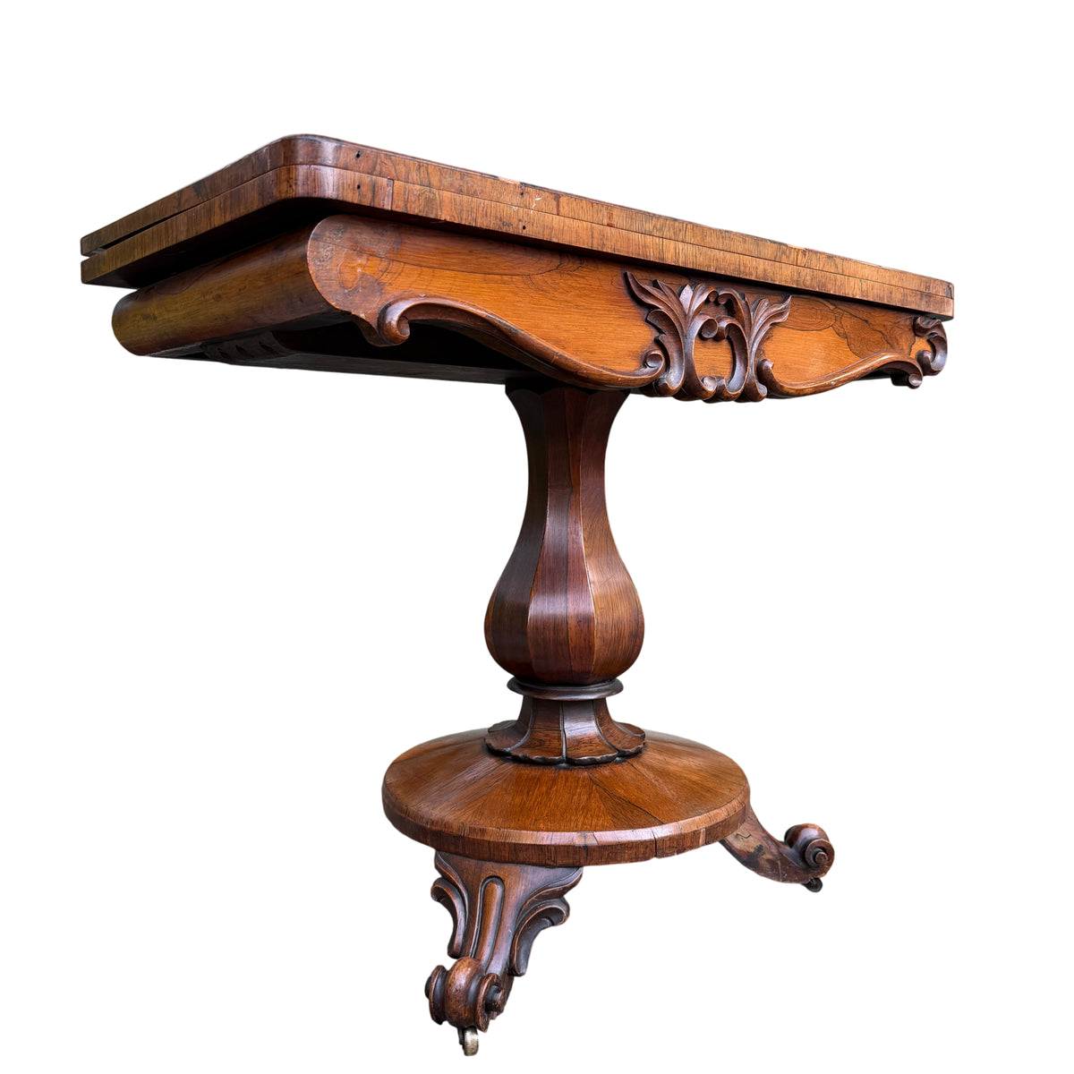 Victorian walnut tilt-top occasional table with carved apron and baize-lined top