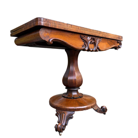 Victorian walnut tilt-top occasional table with carved apron and baize-lined top